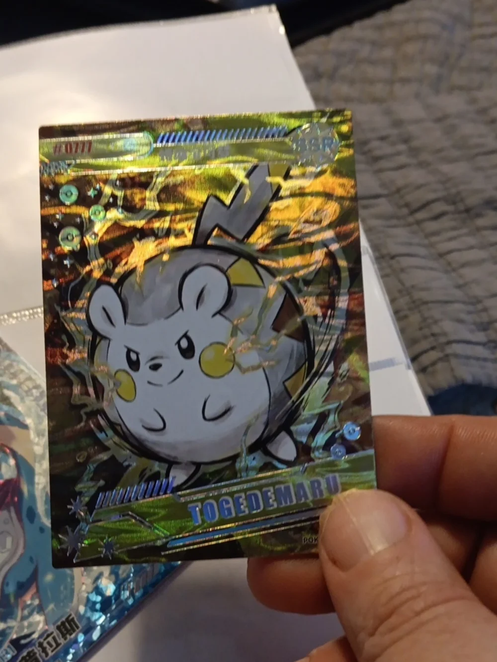 Pokemon Togedemaru Holographic Card - Yellow & Blue Accents